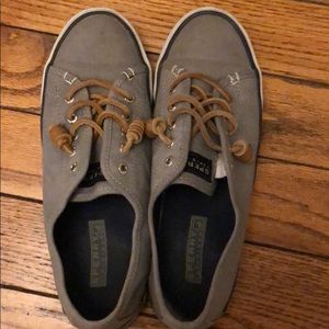 Sperry Topsider tennis shoes.